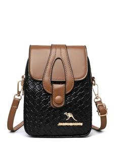 Detail of woven black leather and brown flap with golden kangaroo logo on crossbody bag