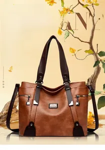 Vue détaillée du sac cabas en cuir rétro marron avec fermeture éclair et texture premium