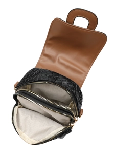 Detail view of woven leather bag showing dual zip compartments and chevron lining