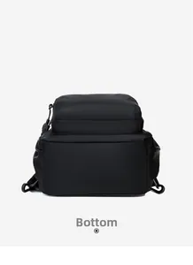 Detailed bottom view showing the durable nylon fabric and thick stitching of the travel backpack