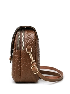 Detailed side view of brown woven texture crossbody bag with gold double zippers