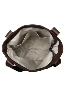 Interior view of brown tote bag with grey herringbone lining and inner pocket detail