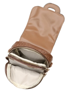 Detail view of woven brown leather crossbody bag with three zippered compartments