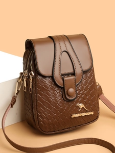 Detailed close-up of dark brown woven PU leather texture and dual gold metal zippers