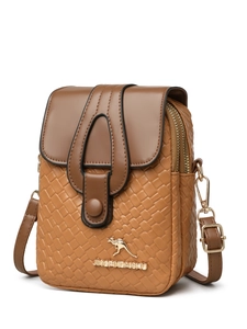 Detail of woven texture and double zipper on the brown patchwork crossbody phone bag
