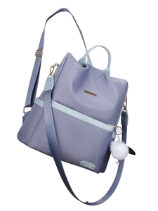 Zaino da donna in tessuto Oxford lilla e blu con ciondolo a sfera di peluche bianco