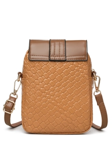 Detail showing woven brown texture and two-tone leather contrast on the small crossbody bag