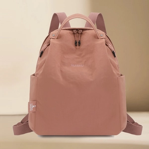Minimalist dusty rose nylon backpack with waterproof fabric and double shoulder straps