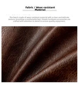 Close-up of brown textured leather fabric with durable grain and minimalist metal hardware