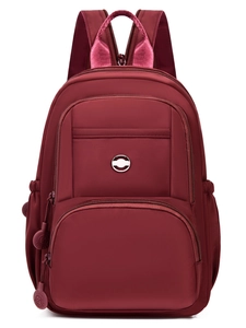 Versatile dark red urban backpack with multiple compartments and high-density nylon fabric