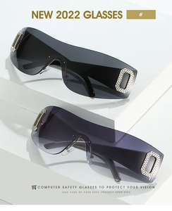 Detail of Y2K sunglasses with rectangular crystal decor on hinges and gradient lenses