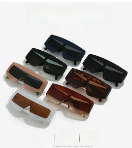 Overhead view of oversized geometric sunglasses collection in seven diverse stylish colors