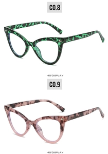 Détail de montures de lunettes œil-de-chat aux textures marbrées et écailles