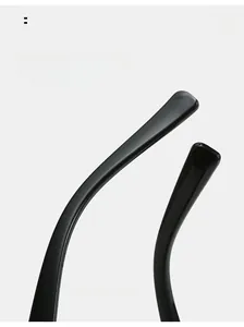 Détail des branches noires brillantes courbées de lunettes œil de chat pour un confort optimal