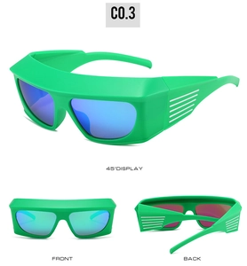Detail view of neon green Y2K sunglasses with blue reflective lenses and white stripes