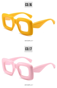Vue détaillée de lunettes PC à monture épaisse en jaune vif et rose poudré doux