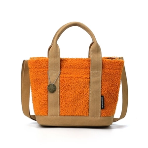 Borsa tote in pile orsetto arancione e tela con tracolla dallo stile minimalista