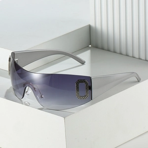 Y2K fashion oversized matte silver sunglasses with purple gradient lenses on white steps