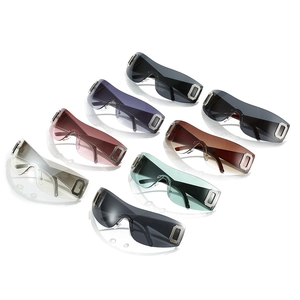 Stylish Y2K frameless sunglasses in multiple vibrant colors with rhinestone accents