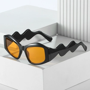 Lunettes de soleil noires irrégulières avec branches ondulées et verres orange vif