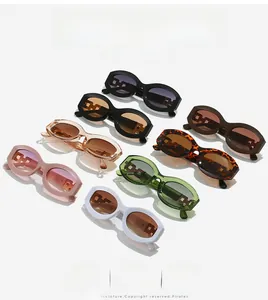 Macro shot of oval sunglasses array featuring hollow metal detail on thick temple arms