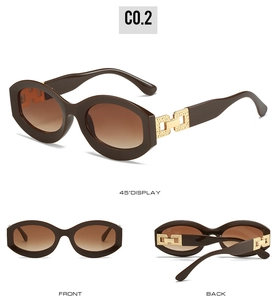 Deep brown oval sunglasses with gradient lenses and golden hollow metal temples details