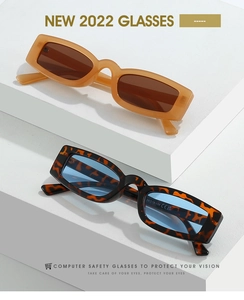 Detailed view of rectangle sunglasses showing frame specifications and CE certification marks