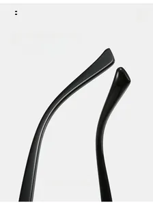 Detail of curved ergonomic temple arms on black square sunglasses for comfortable wear