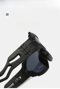 Detail of matte black Y2K punk sunglasses temple with hollow geometric design and texture
