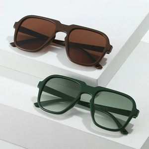 Retro oversized geometric sunglasses in brown and dark green frames with UV400 lenses