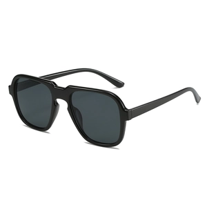 Classic black geometric aviator sunglasses with dark grey lenses in a 45-degree side view
