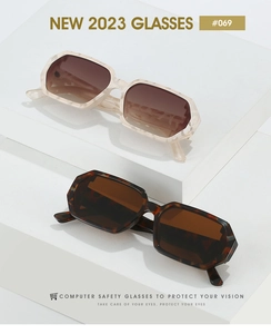 Close-up of polygon frame sunglasses in marble cream and classic tortoise shell finish