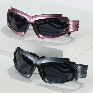 Futuristic Y2K punk sunglasses with wrap around shield frames in metallic purple and black