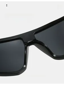 Detail of comfortable nose pads and sleek bridge on Y2K black oversized sports sunglasses