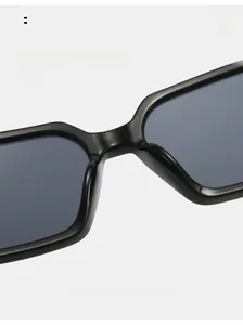 Detail view of ergonomic integrated nose pads on black polygon frame sunglasses