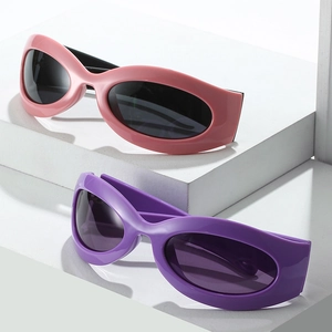 Retro Y2K oversized cat eye sunglasses in pink and purple colors for sports and fashion