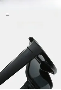 Detailed close-up of lightweight elastic hinges on minimalist black oversized sunglasses