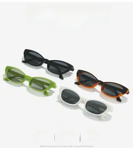 Cat-eye sunglasses stack showing glossy black, green, white and tortoiseshell frames