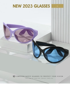 Detail of lavender and black oval computer safety glasses on geometric white pedestals
