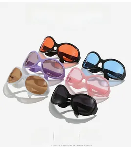 Macro detail of oval oversized sunglasses in six colors with stylish flat lay shadow