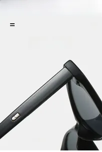 Close-up of lightweight black sunglasses hinges with durable silver metal hardware