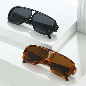 Fashionable oversized double bridge sunglasses in classic black and tortoise finishes