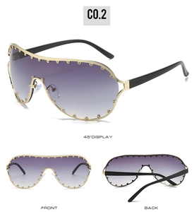 Three-way view of oversized purple gradient sunglasses with rhinestone-studded gold frames