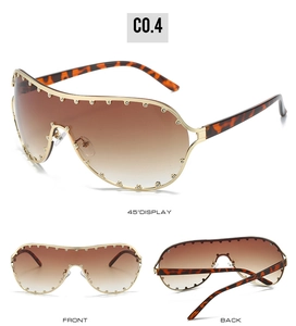Three-view display of oversized shield sunglasses with gold frames and amber gradient lenses
