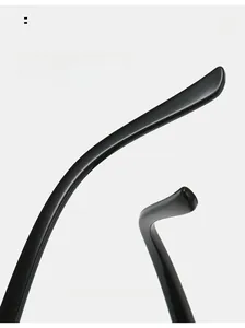 Detail view of ergonomic curved temples on black fashion sunglasses for comfortable wear