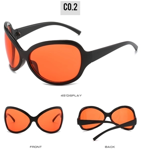 Lunettes de soleil oversize alien avec monture noire et verres orange en multi-vues