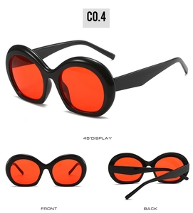 Vue triple de lunettes de soleil ovales avec monture noire et verres rouges vifs