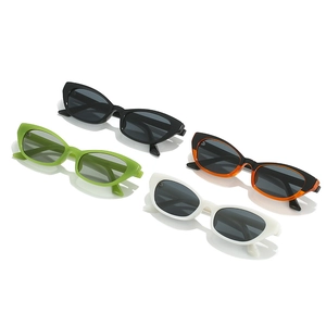 Retro cat-eye sunglasses for women in black, green, orange, and white resin frames