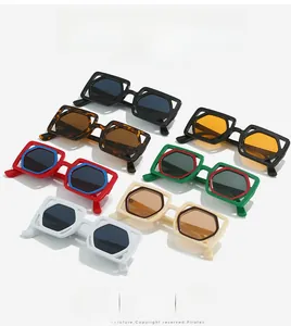Detail view of colorful geometric square frame sunglasses in seven trendy color combinations