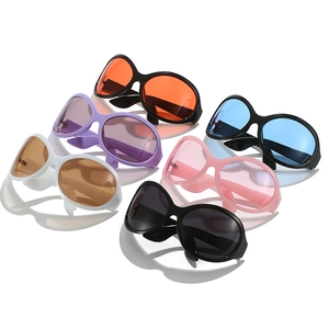 Oversized oval sunglasses in multiple vibrant colors for a Y2K hip hop look